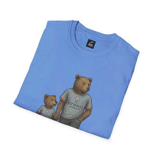 Light blue t-shirt with illustration of two bears wearing Manchester City jerseys holding hands