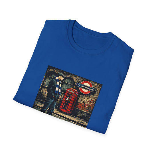 Folded blue t-shirt with a London-themed graphic on a white background