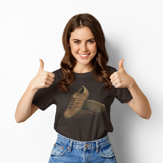 Woman wearing a Brown t-shirt with a adidas sneaker graphic