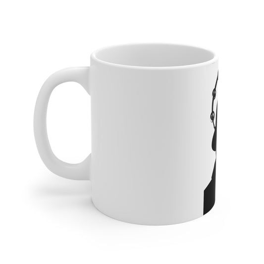 White ceramic coffee mug with black silhouette design of a person wearing headphones