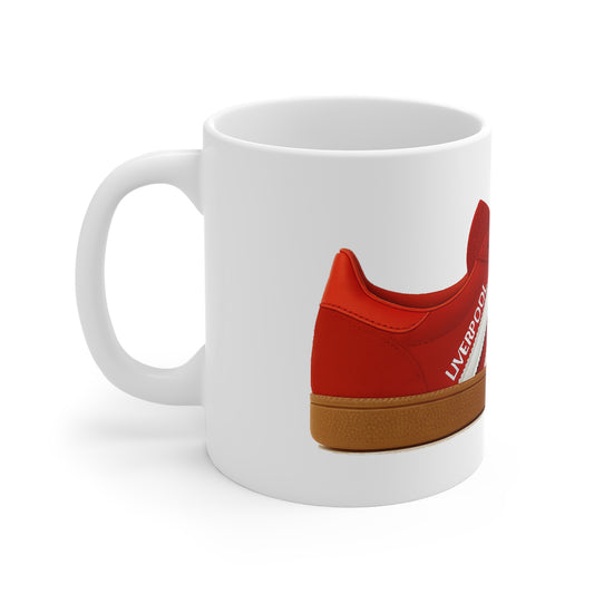 White mug with side print of a red shoe featuring brown sole and white text Liverpool