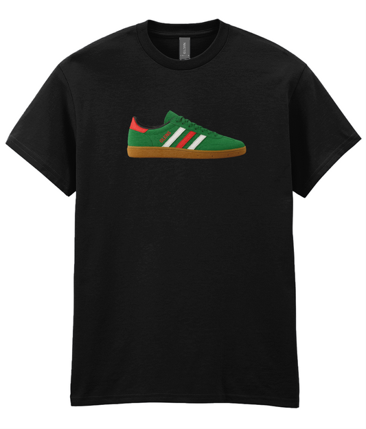 Black T-shirt featuring a graphic of a green sneaker with red accents and white stripes