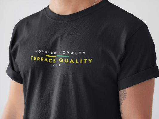 Close-up of man wearing black Norwich Loyalty Terrace Quality tee in white and yellow