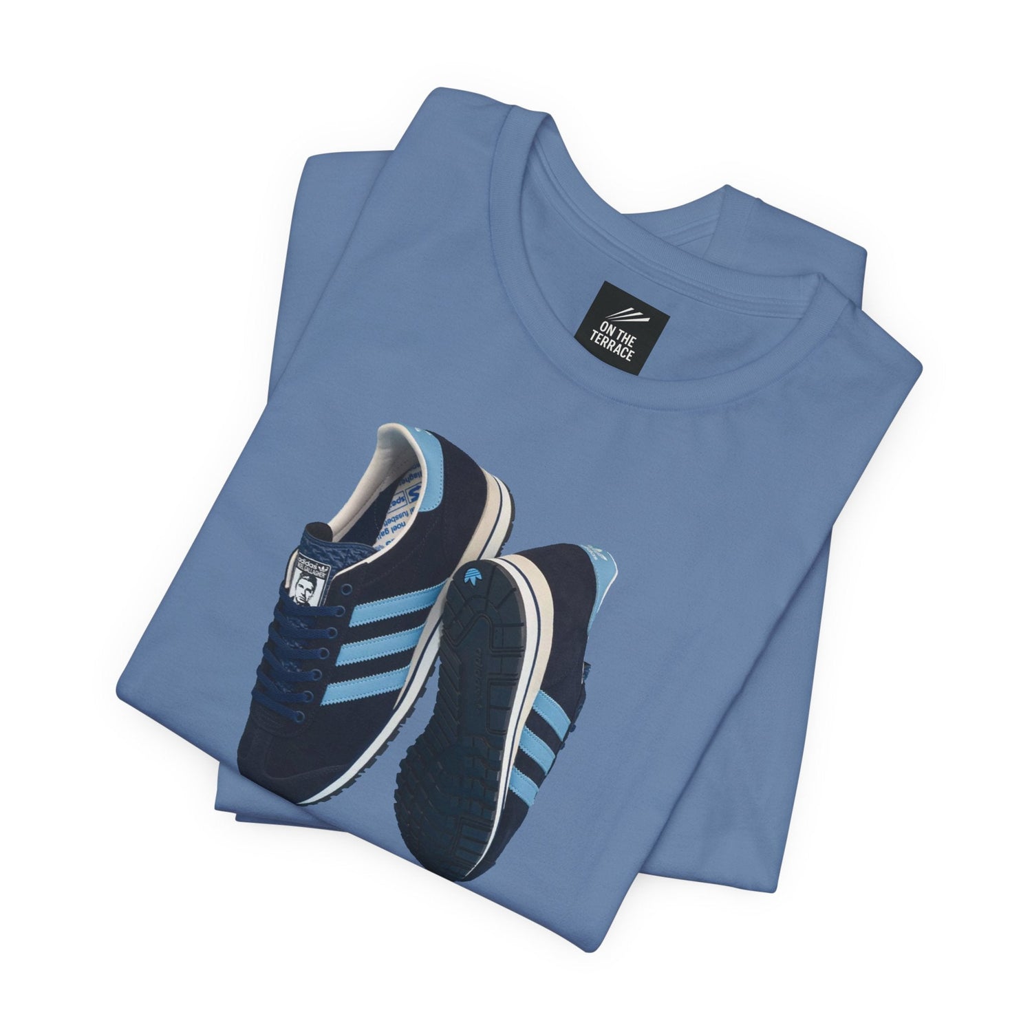 Blue crew neck t-shirt with printed design of retro navy and light blue sneakers