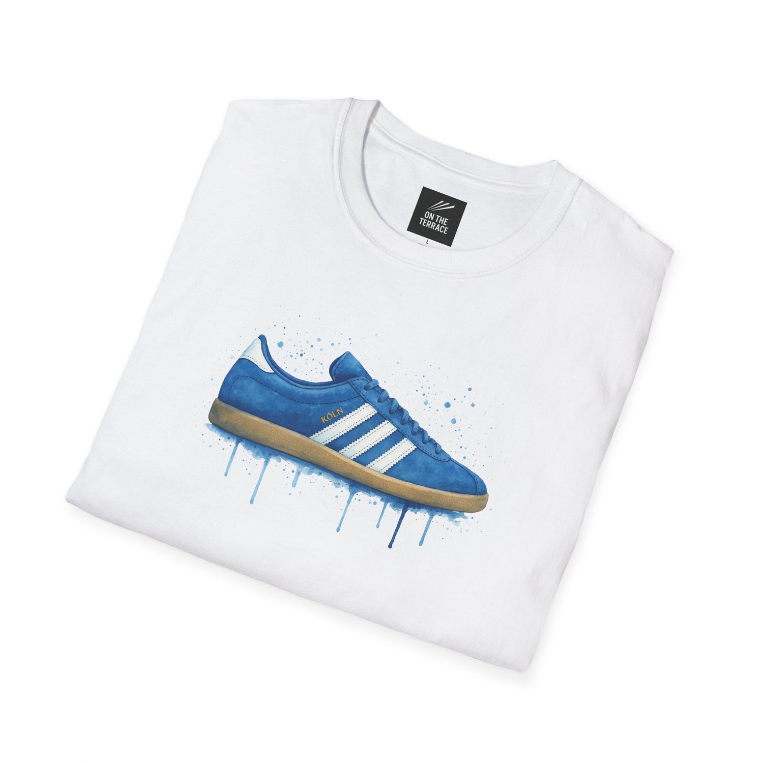White T-shirt with blue sneaker graphic featuring Köln text and artistic paint splatter design