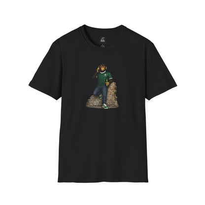 A black t-shirt featuring a chimpanzee wearing a green and white pinstriped football jersey and green trainers, leaning on a brick wall while using a mobile phone.