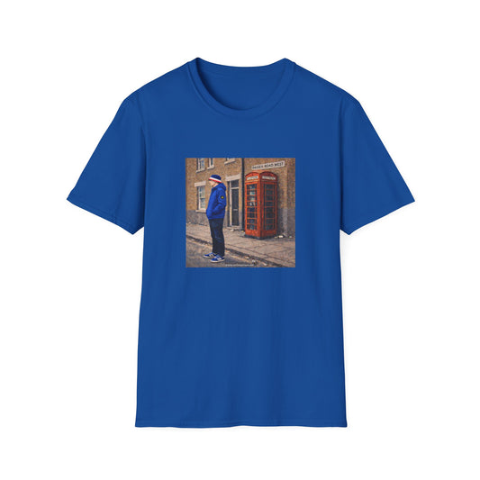 Blue t-shirt with a printed design of a person by a red phone box on a white background