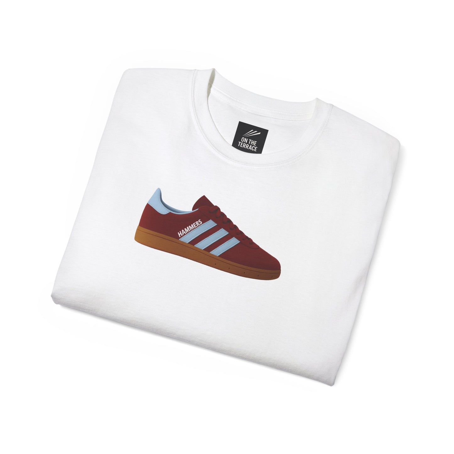 White folded t-shirt with a graphic of a maroon and light blue sneaker labeled Hammers on front