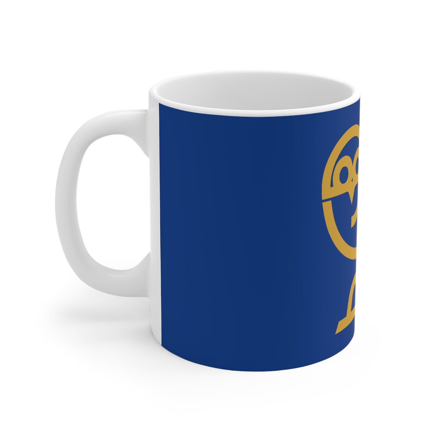 White ceramic mug with blue background and partial yellow owl logo design