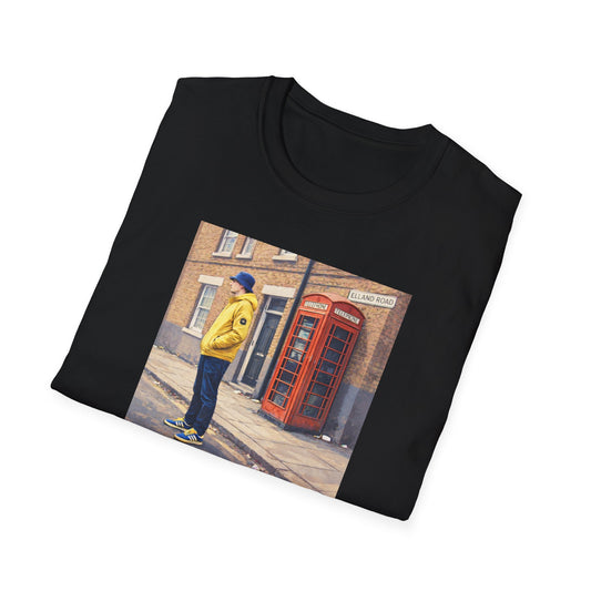 Folded Black Leeds t-shirt featuring a football casual print of a man in a yellow jacket and blue hat by a classic red British phone booth on Elland Road
