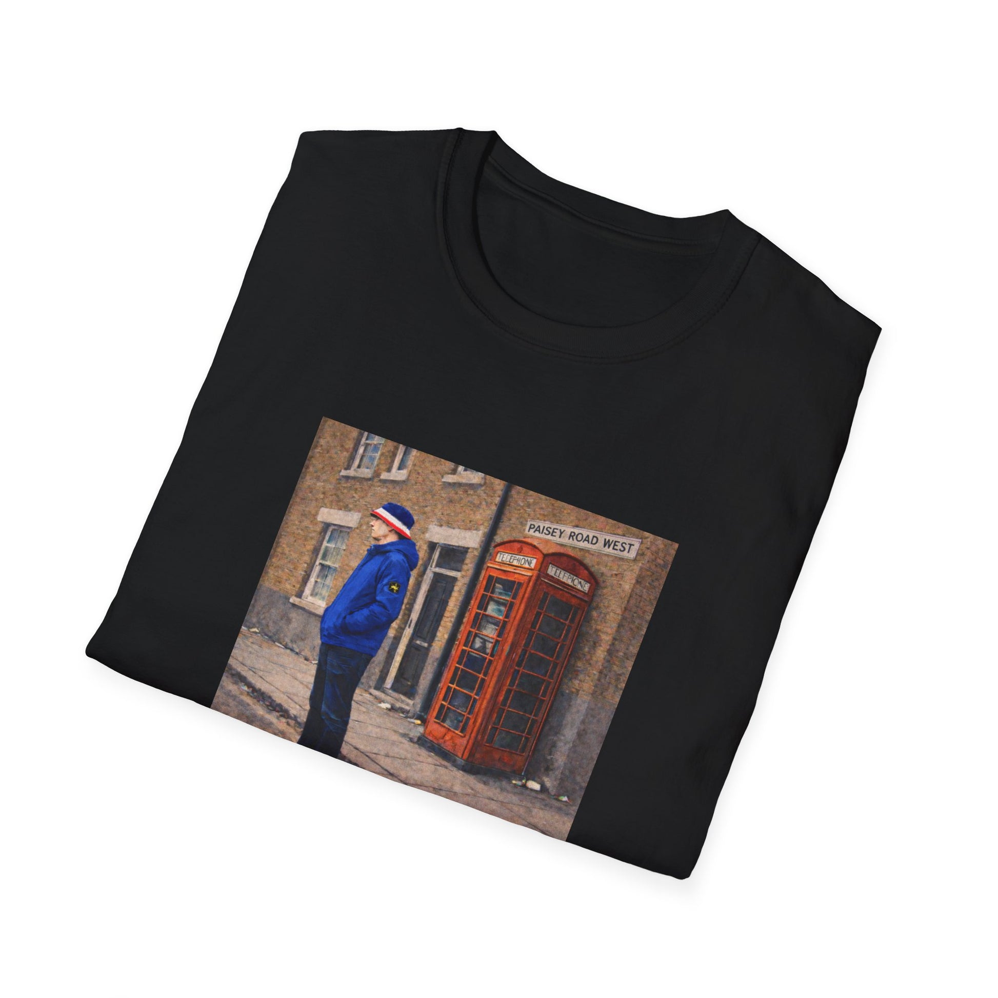 Black t-shirt with a printed design of a person in a blue coat standing next to a red telephone box.
