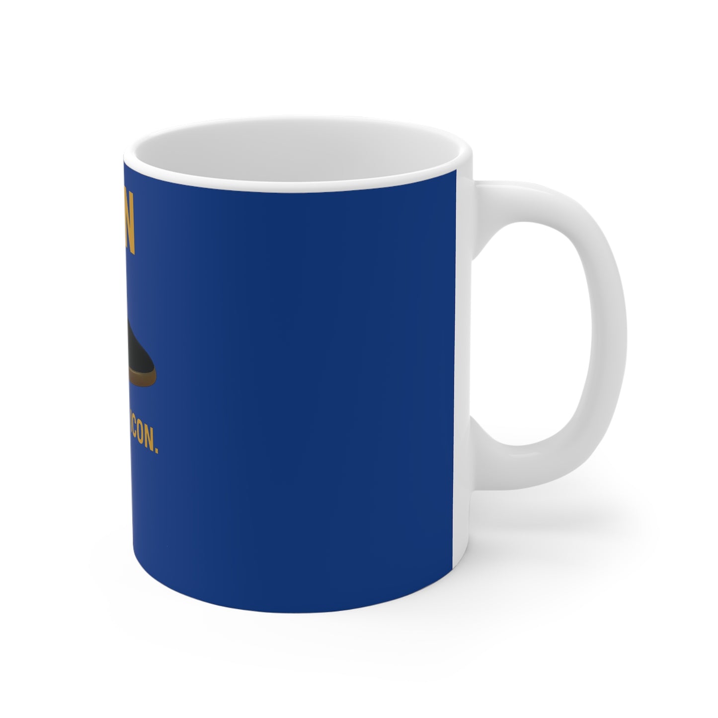White ceramic mug with blue background and partial black and brown design