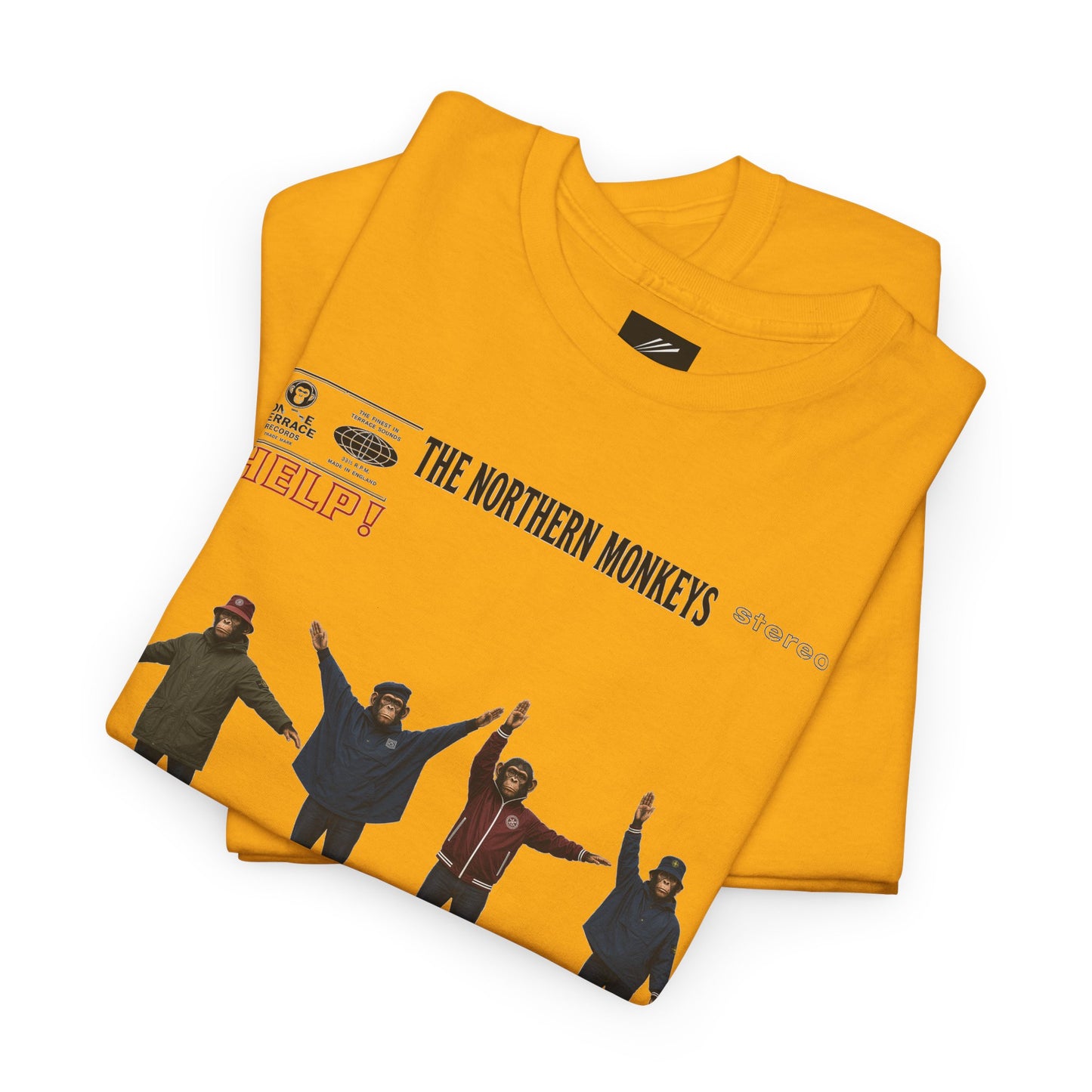 Close-up of Northern Monkeys Help Casuals graphic on mustard T-shirt