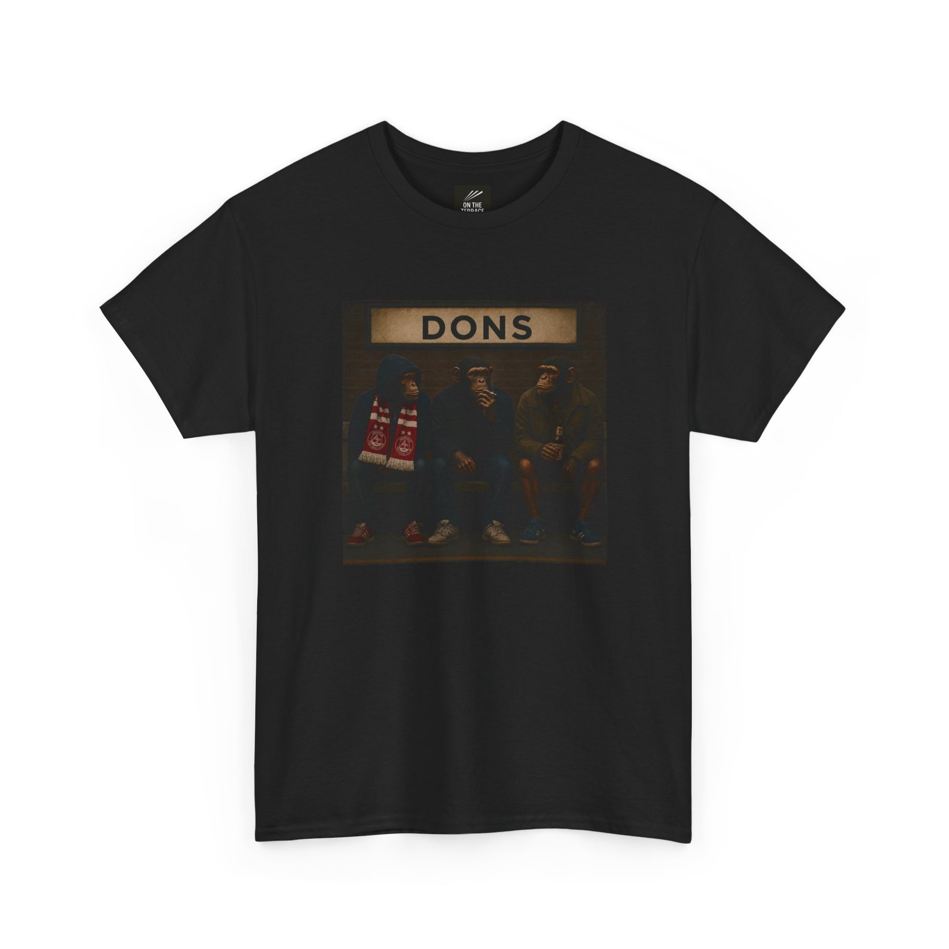 A black short-sleeve crewneck Aberdeen t-shirt featuring a rectangular graphic print on the front with the word 'DONS' above a dark-toned illustration of four men standing together.