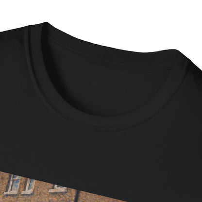 Close-up of a black t-shirt collar with a blurred background