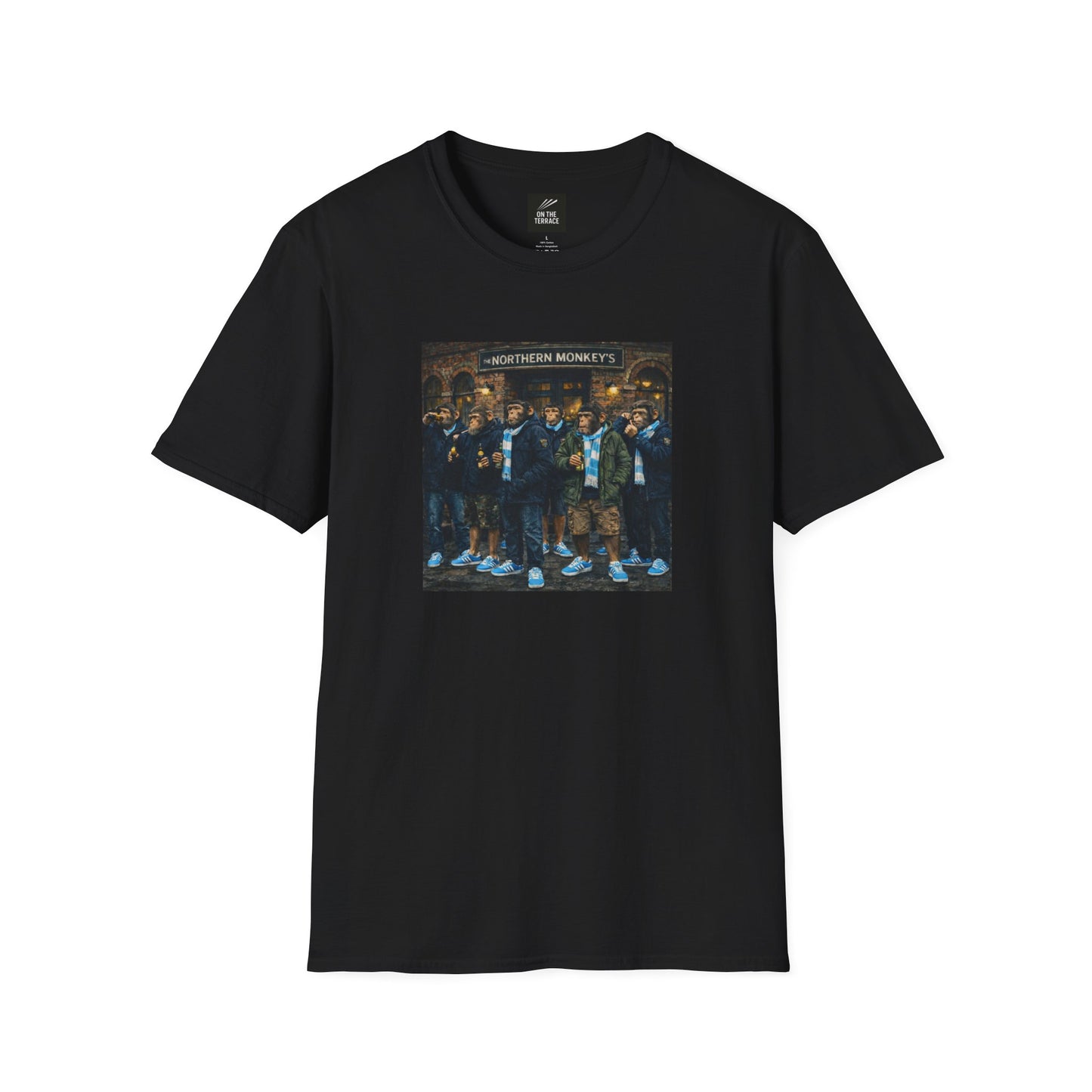 Black t-shirt with a graphic of chimpanzees dressed as Manchester City fans in scarves and parkas standing outside a pub called "The Northern Monkey's."