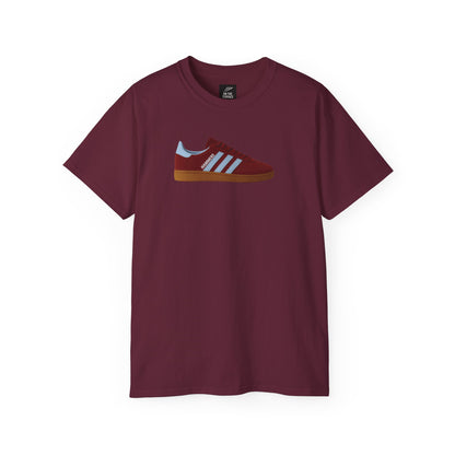 Burgundy t-shirt with graphic of red and blue sneaker labeled HAMMERS on front