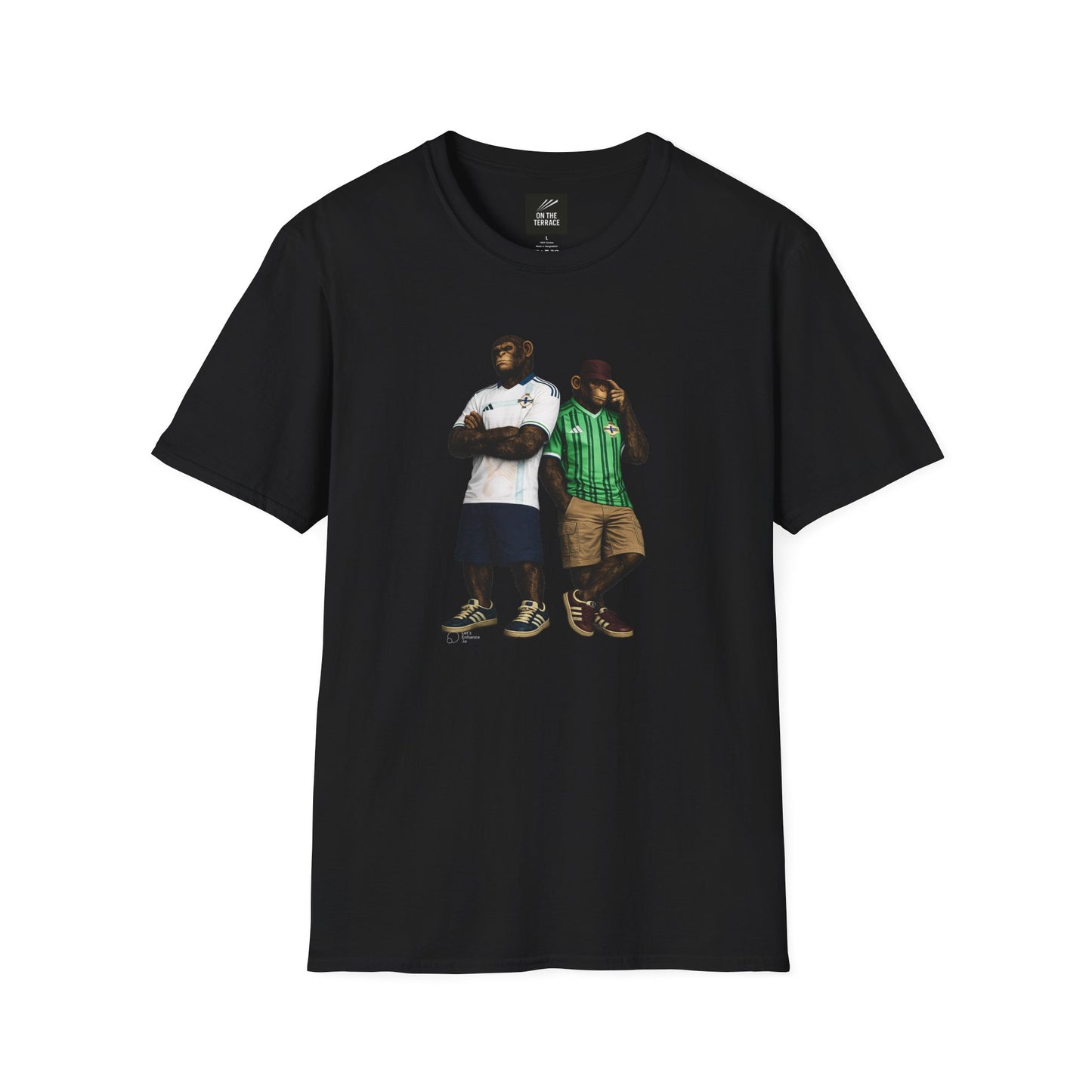 A black short-sleeved t-shirt featuring a central graphic of two chimpanzees styled as Northern Ireland national team supporters. The chimpanzee on the left stands with arms crossed, wearing a white away jersey with blue trim and the Northern Ireland crest. The chimpanzee on the right wears the classic green home jersey with vertical stripes, khaki cargo shorts, and a maroon bucket hat