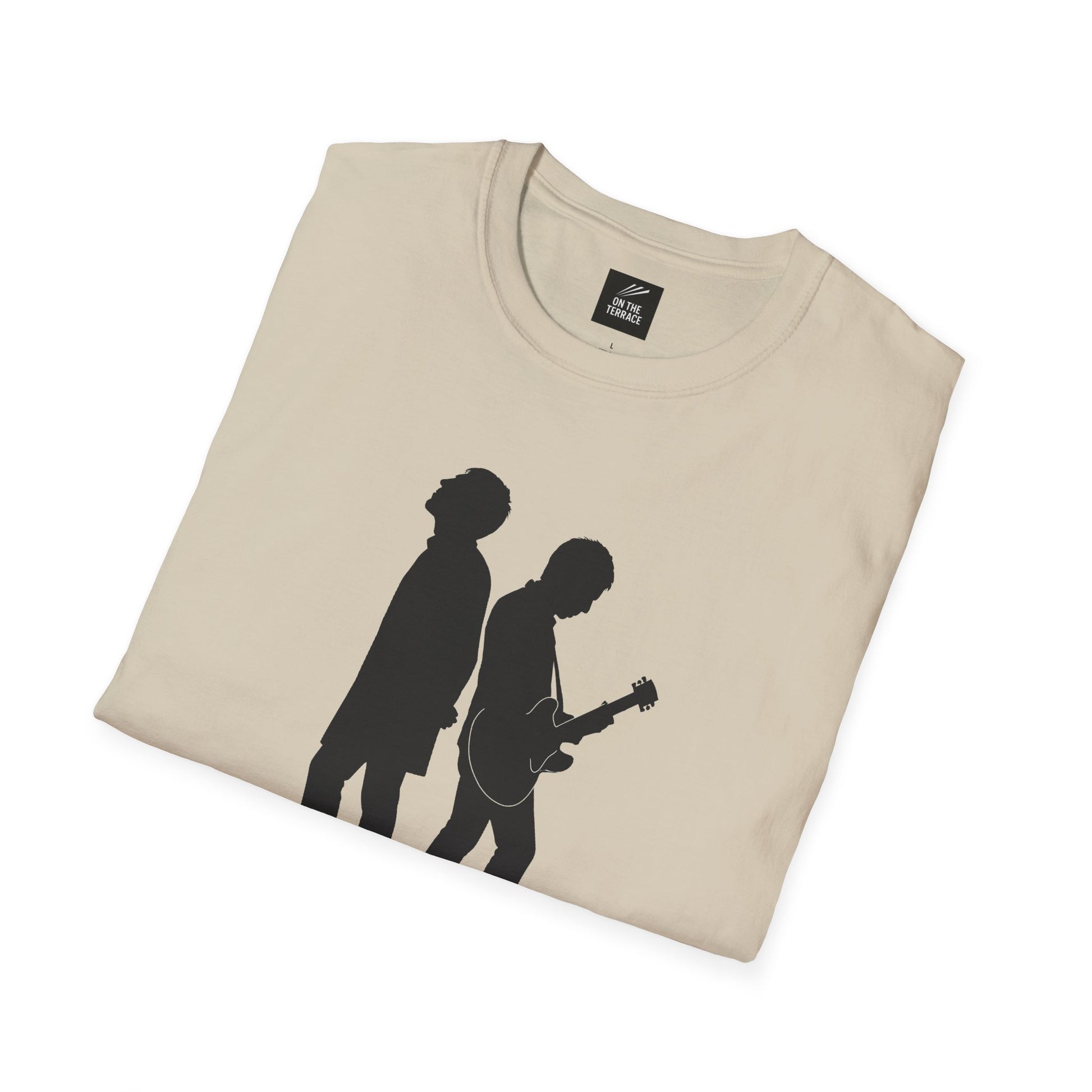 Beige folded t-shirt with black silhouette of two men, one playing guitar, music band design