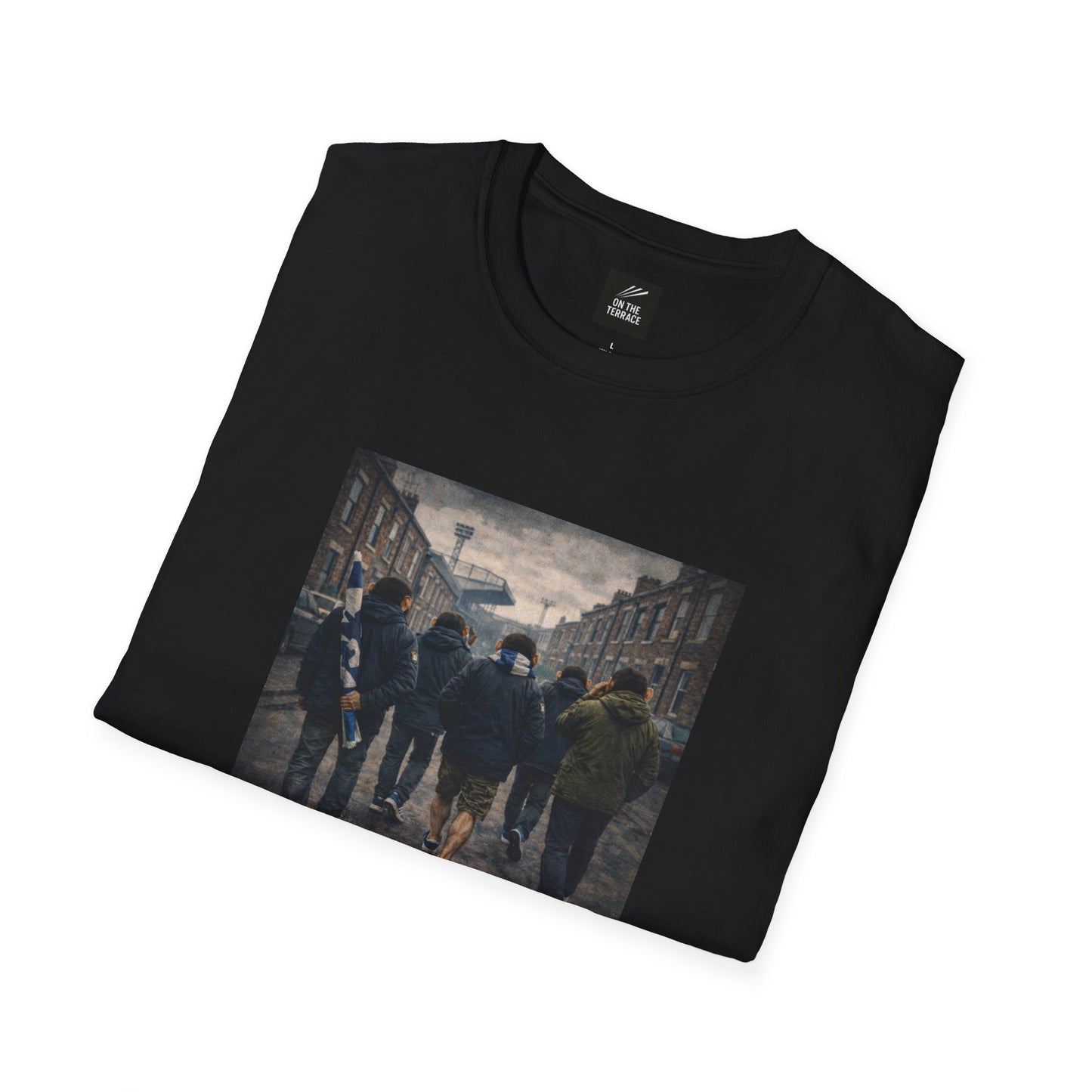 folded Black graphic t-shirt by On The Terrace featuring a cinematic image of football fans walking through a terraced street toward a stadium