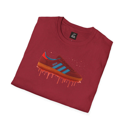 Burgundy t-shirt with graphic of red and blue sneaker and paint drip effect