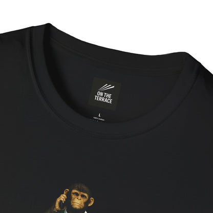 A close-up shot of the interior neckline of a black t-shirt showing the "ON THE TERRACE" brand logo, the size "L", and a "100% Cotton" label printed directly onto the fabric.