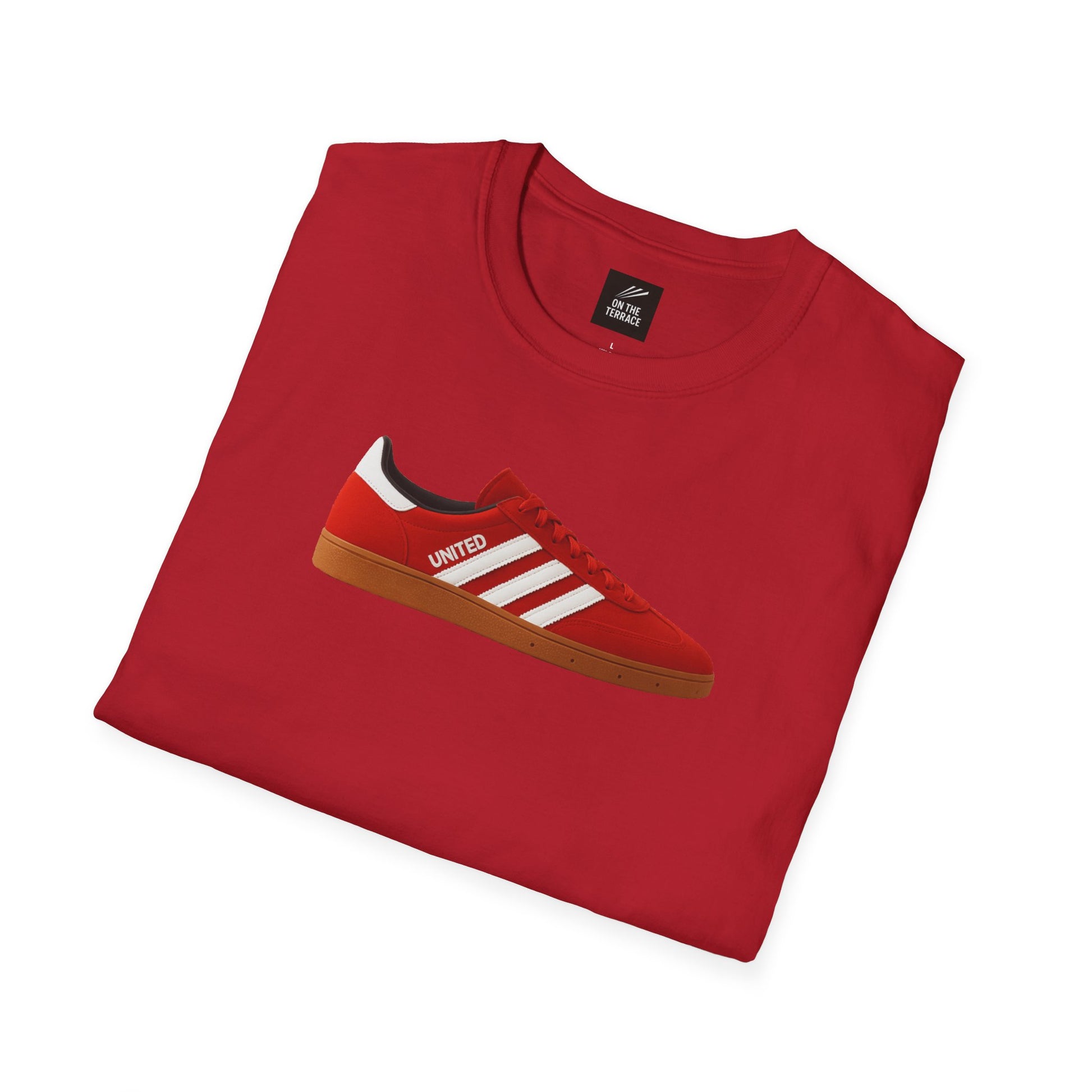 Red folded t-shirt with graphic of red sneaker featuring white stripes and word UNITED