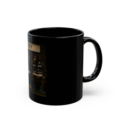 Black mug with a printed design on a white background