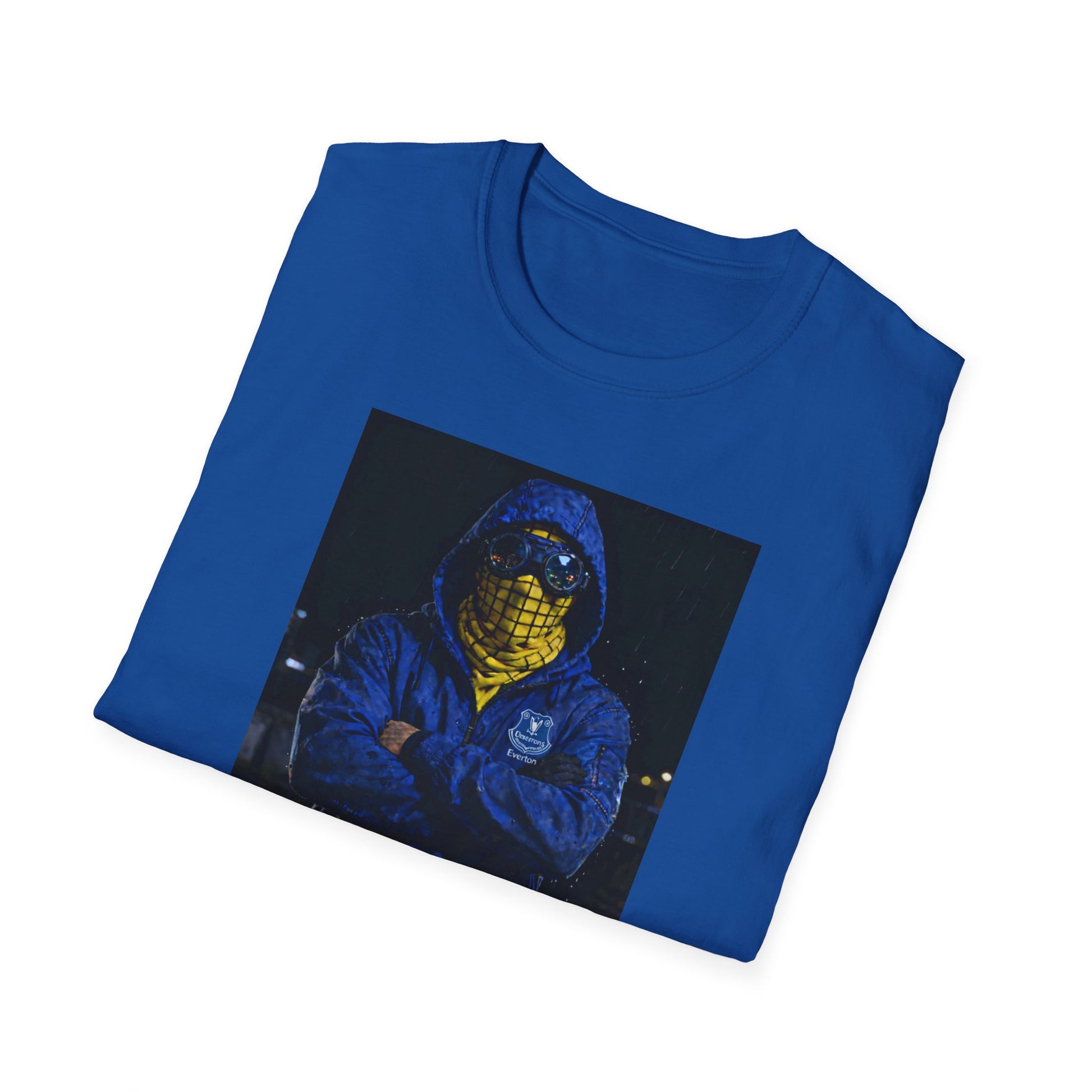 Blue t-shirt featuring a graphic of a hooded figure wearing goggles and a yellow patterned scarf, with an Everton crest on the jacket