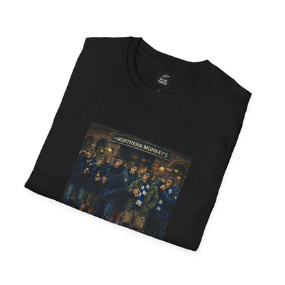 Folded black t-shirt with a graphic design on a white background