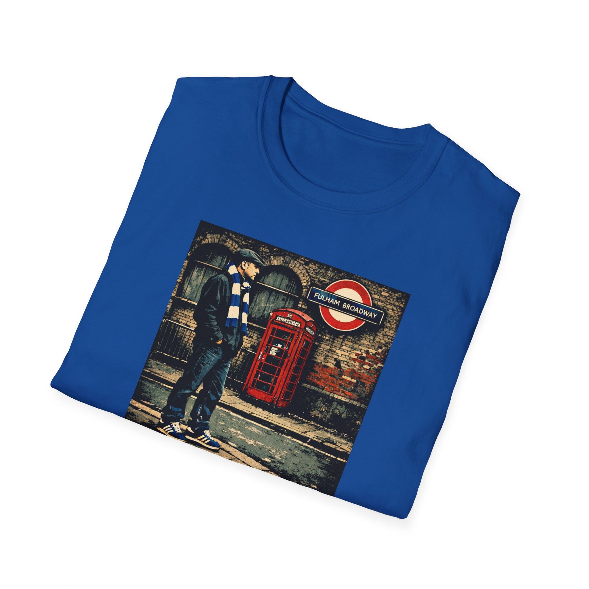  Blue folded Chelsea T-shirt of a football casual stood outside a tube station on match day near a red telephone box
