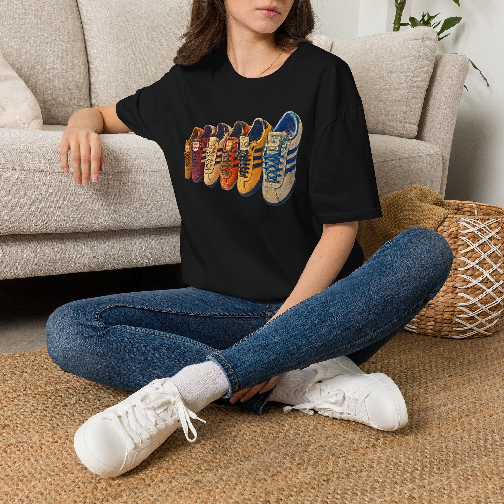 black t-shirt with 5 adidas style trainers
