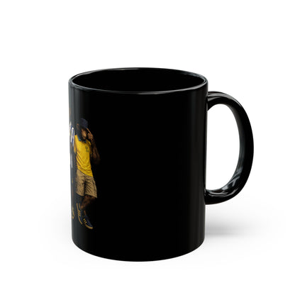 A black ceramic coffee mug featuring a detailed graphic print, showing two chimpanzees dressed in retro Sheffield Wednesday football kits; one wears the blue-and-white striped ASDA home shirt, and the other wears a yellow away shirt with a navy bucket hat.