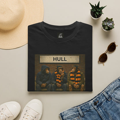 On The Terrace Northern Monkeys black graphic t-shirt featuring three casual monkeys on a bench under a Hull train station sign.