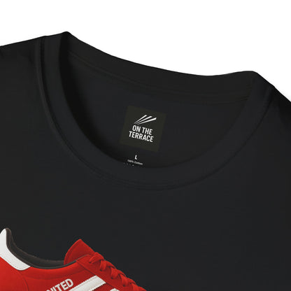 Black cotton T-shirt with On The Terrace label and red sneaker partially visible at bottom