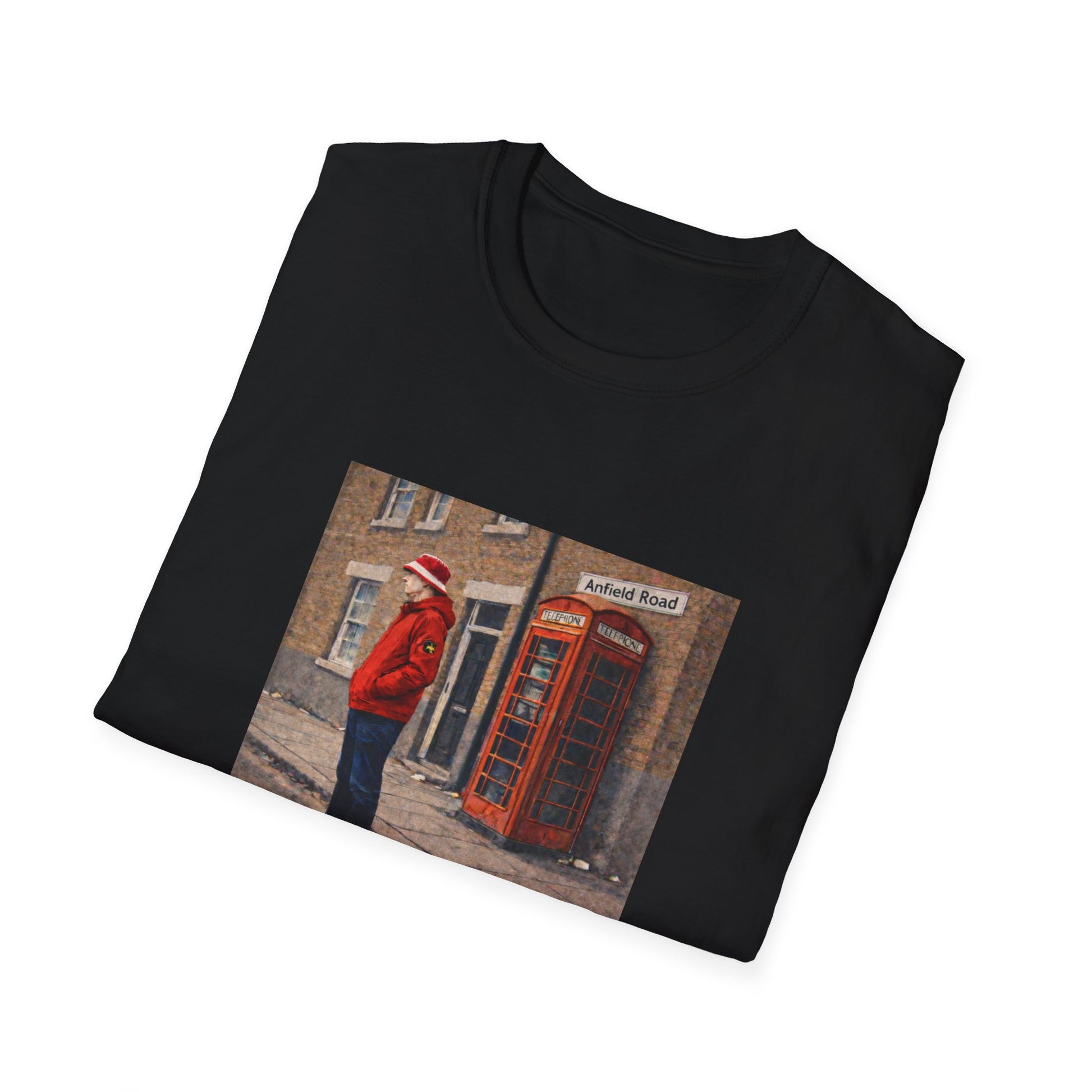 Black t-shirt with a printed design of a person in a red coat standing next to a red telephone box on a white background