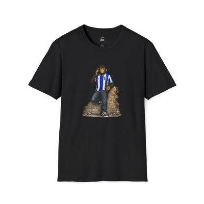 A black t-shirt with a graphic of a single chimpanzee wearing a blue and white striped Sheffield Wednesday football kit, blue trainers, and jeans, leaning against a small brick wall while holding a green bottle and talking on a mobile phone.