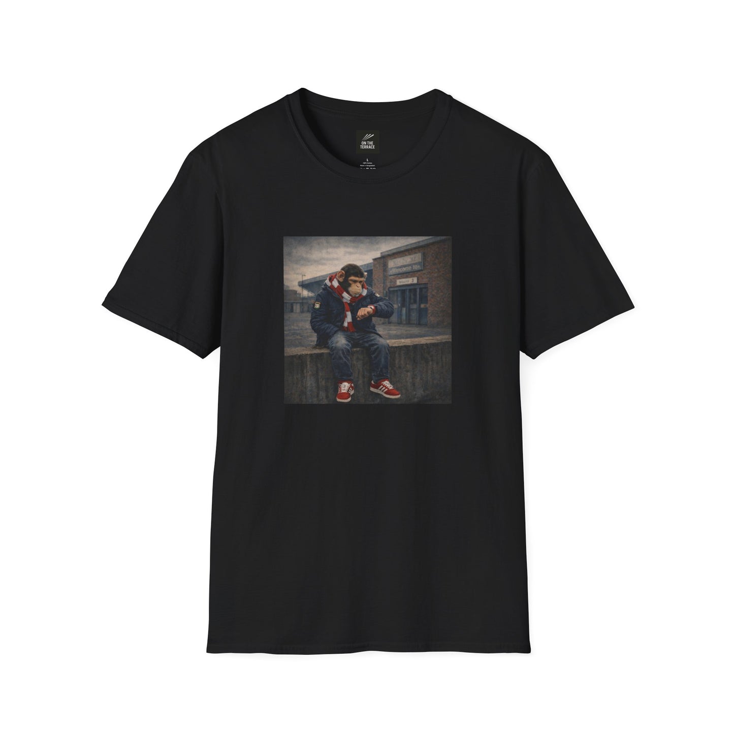 Black t-shirt with a graphic print of a person sitting on a bench in an urban setting.