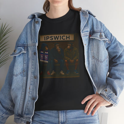 Person wearing a denim jacket over a dark Ipswich t-shirt with a logo and text.