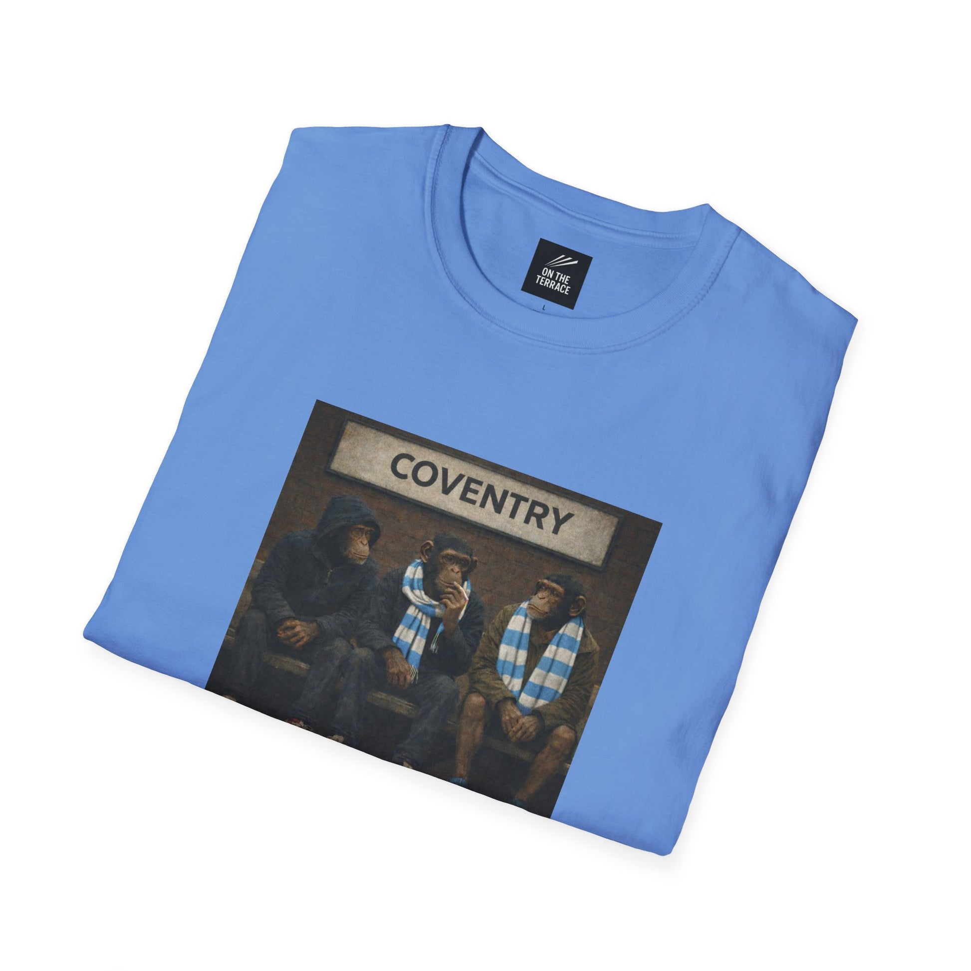 Coventry City Fan T-Shirt Folded blue t-shirt with a graphic of three people and 'Coventry' text on a white background