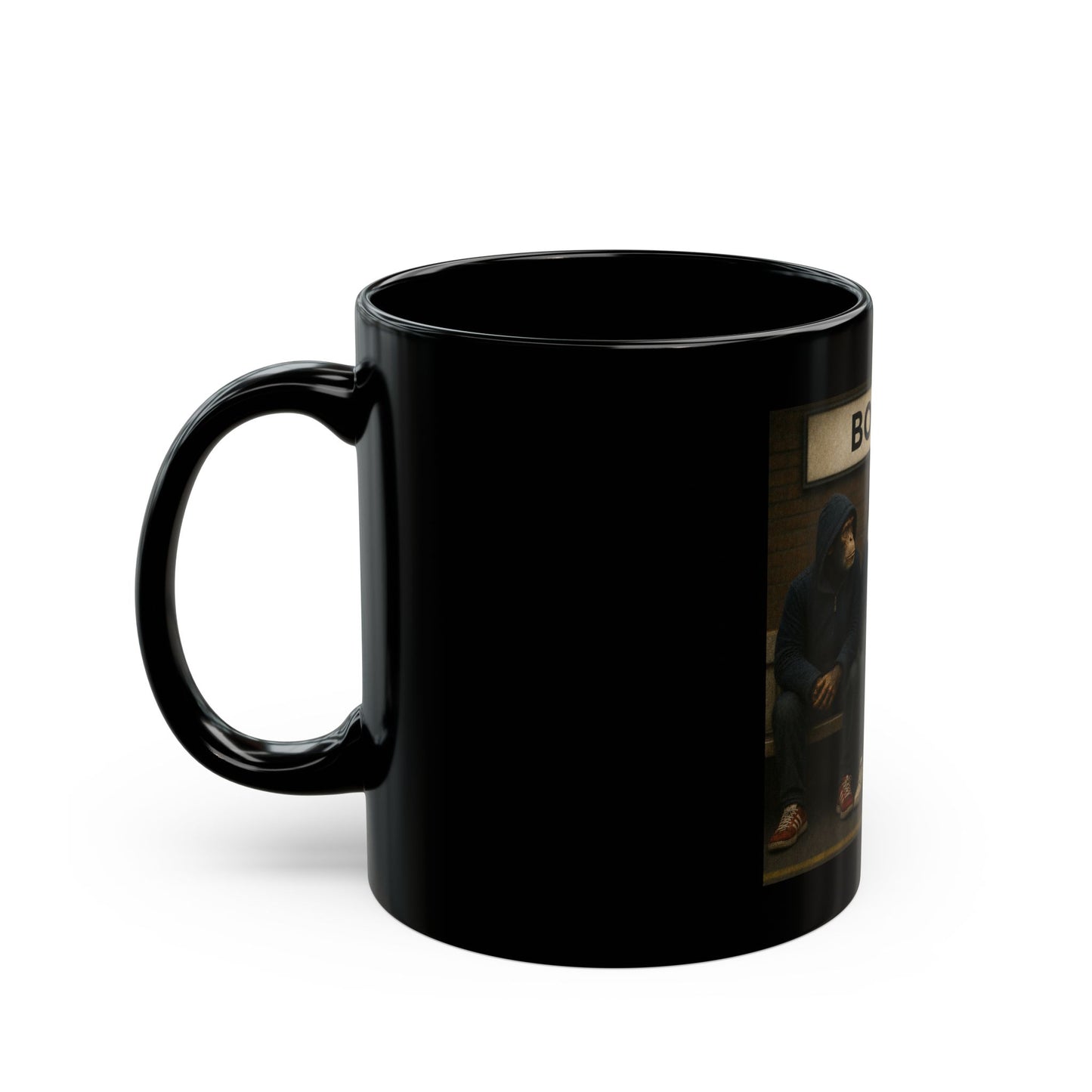 A high-gloss black ceramic mug features a rectangular graphic of three chimpanzees dressed as 1980s football casuals sitting on a railway platform bench. Above them hangs a vintage cream station sign with the word "BOLTON" in black capital letters. The monkeys wear casual coats, hoodies, retro low-profile trainers, and navy, white, and red striped bar scarves against a brick wall background.