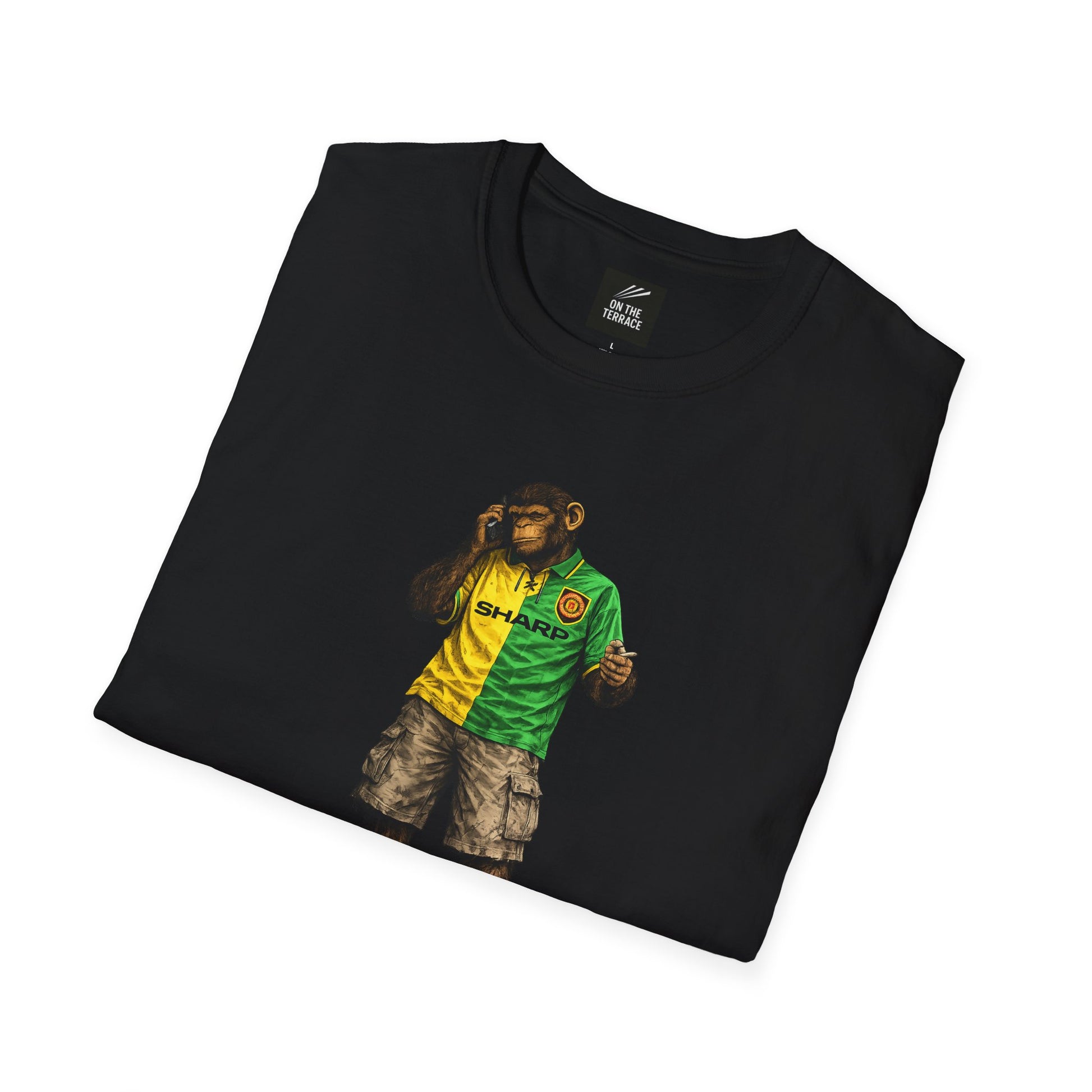 Black Man Utd Northern Monkeys t-shirt with a graphic of a monkey in a yellow and green shirt on a white background