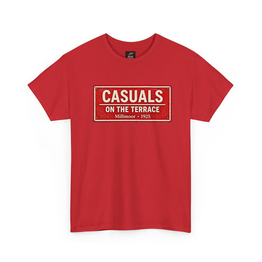 A red short-sleeve Rotherham t-shirt with a vintage-style rectangular graphic on the chest that reads 'CASUALS ON THE TERRACE Millmoor - 1925' in cream and white lettering.