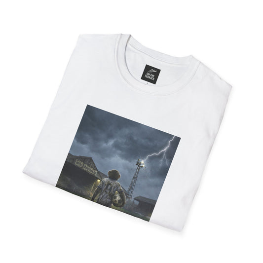 White t-shirt with a graphic design of a person under a stormy sky with lightning, on a white background.