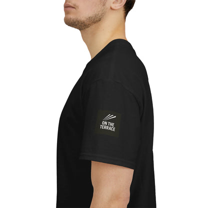 Manchester United-inspired black terrace tee with retro trainer artwork