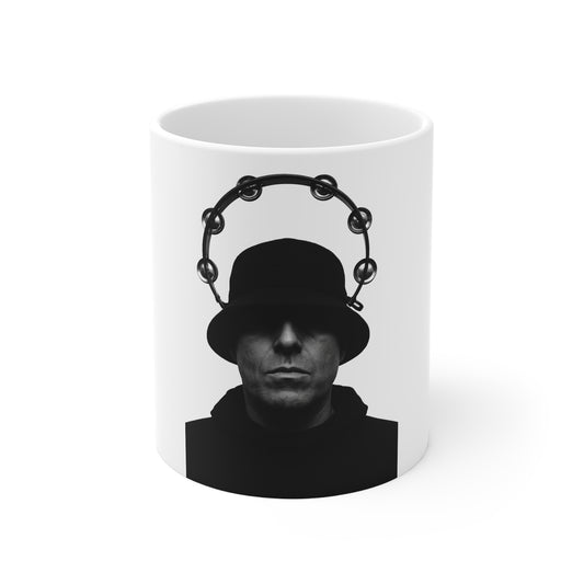 White mug featuring black and white portrait of man wearing a bucket hat with tambourine halo