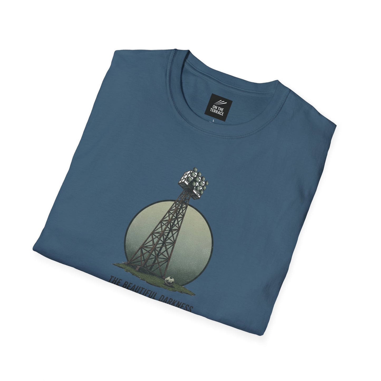 Blue t-shirt with stadium floodlight tower and soccer ball graphic, text 'The Beautiful Darkness'