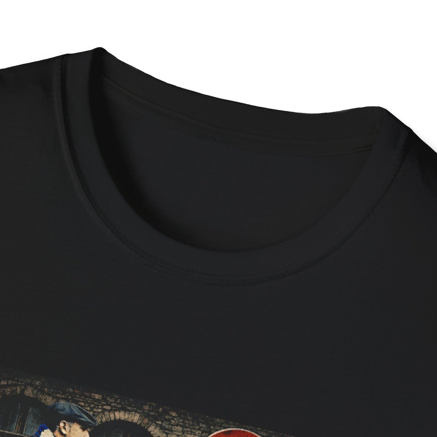 Close-up of a black t-shirt with a graphic design on a white background