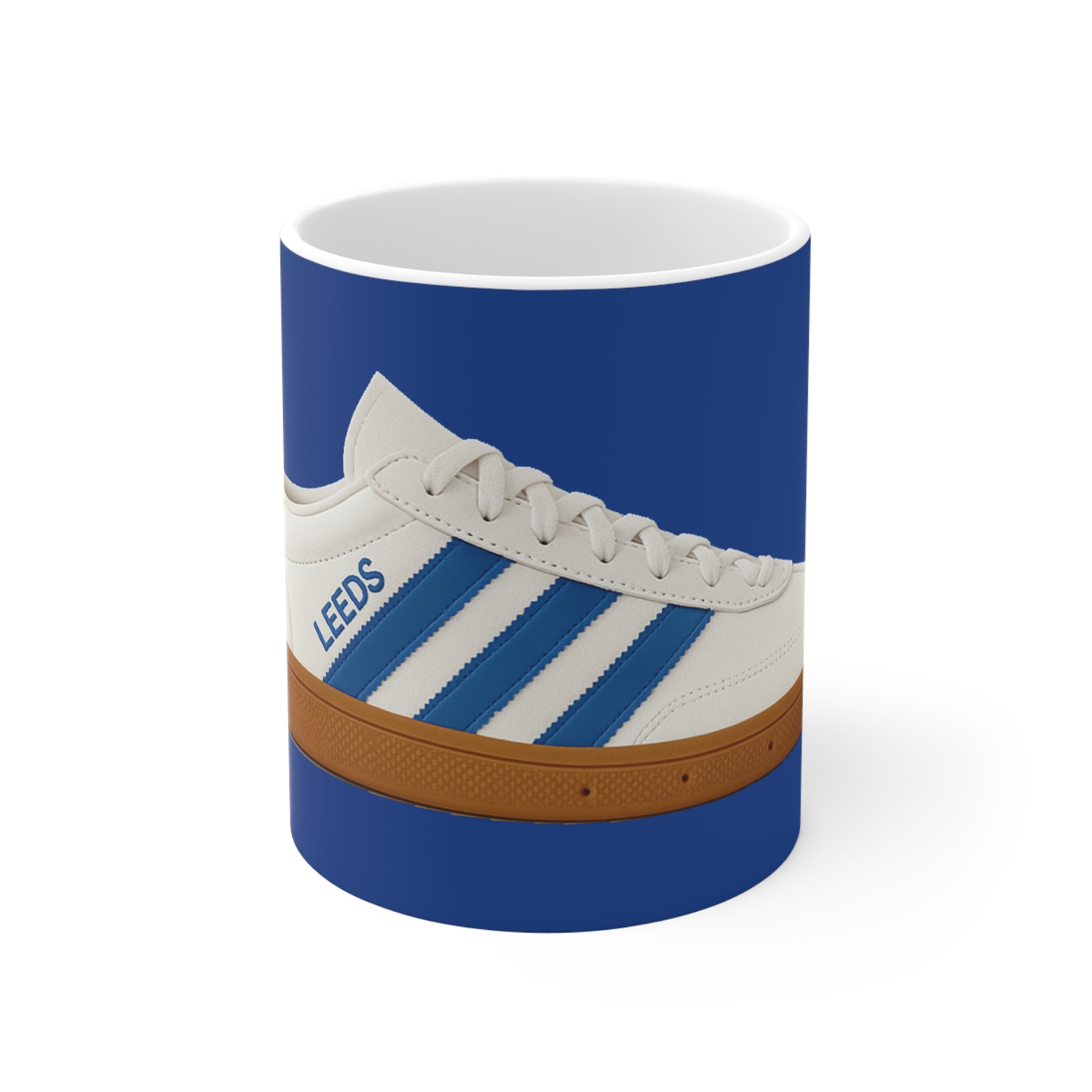 White and blue sneaker with 'LEEDS' text on blue background mug