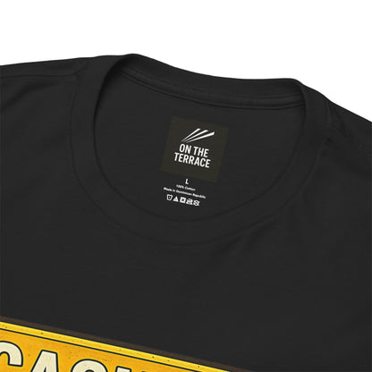 Close-up of a black Watford t-shirt showing the inner neck label which reads 'ON THE TERRACE' and a partial yellow graphic at the bottom edge.